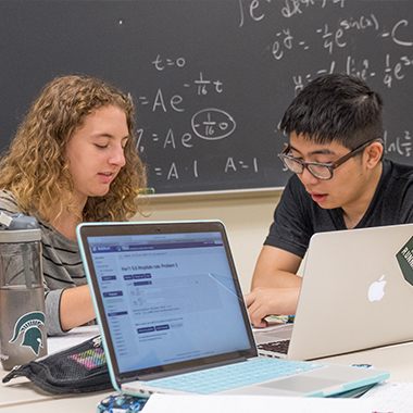 Students working at a desk